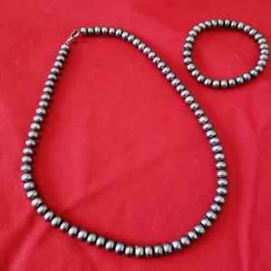 Black cultured pearl necklace & bracelet.